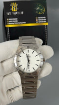 Silver with white Dial.
