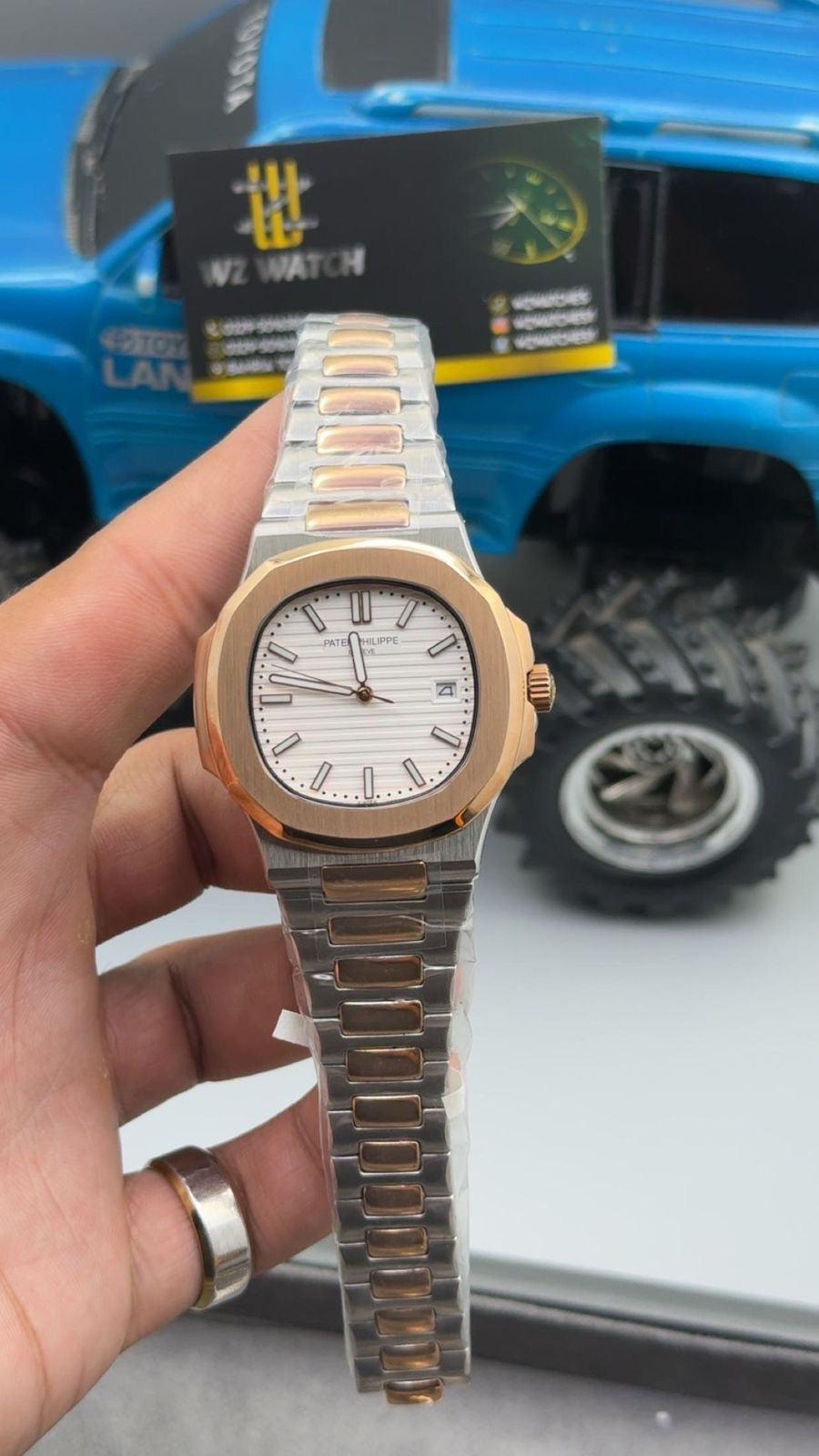 Rose gold two tone with white Dial.