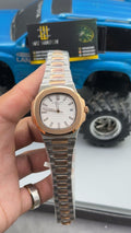 Rose gold two tone with white Dial.