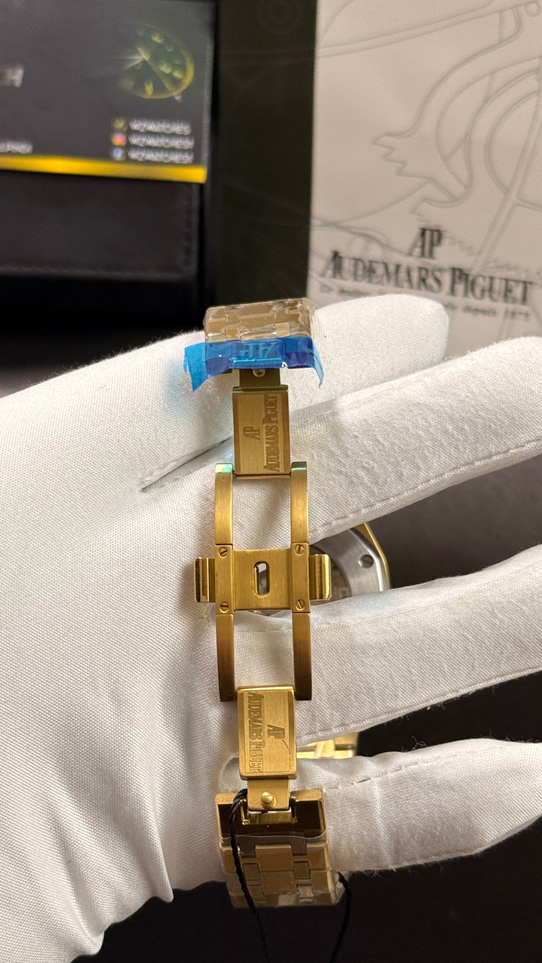 Yellow gold with black skeleton dial