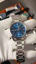 Silver with blue Dial