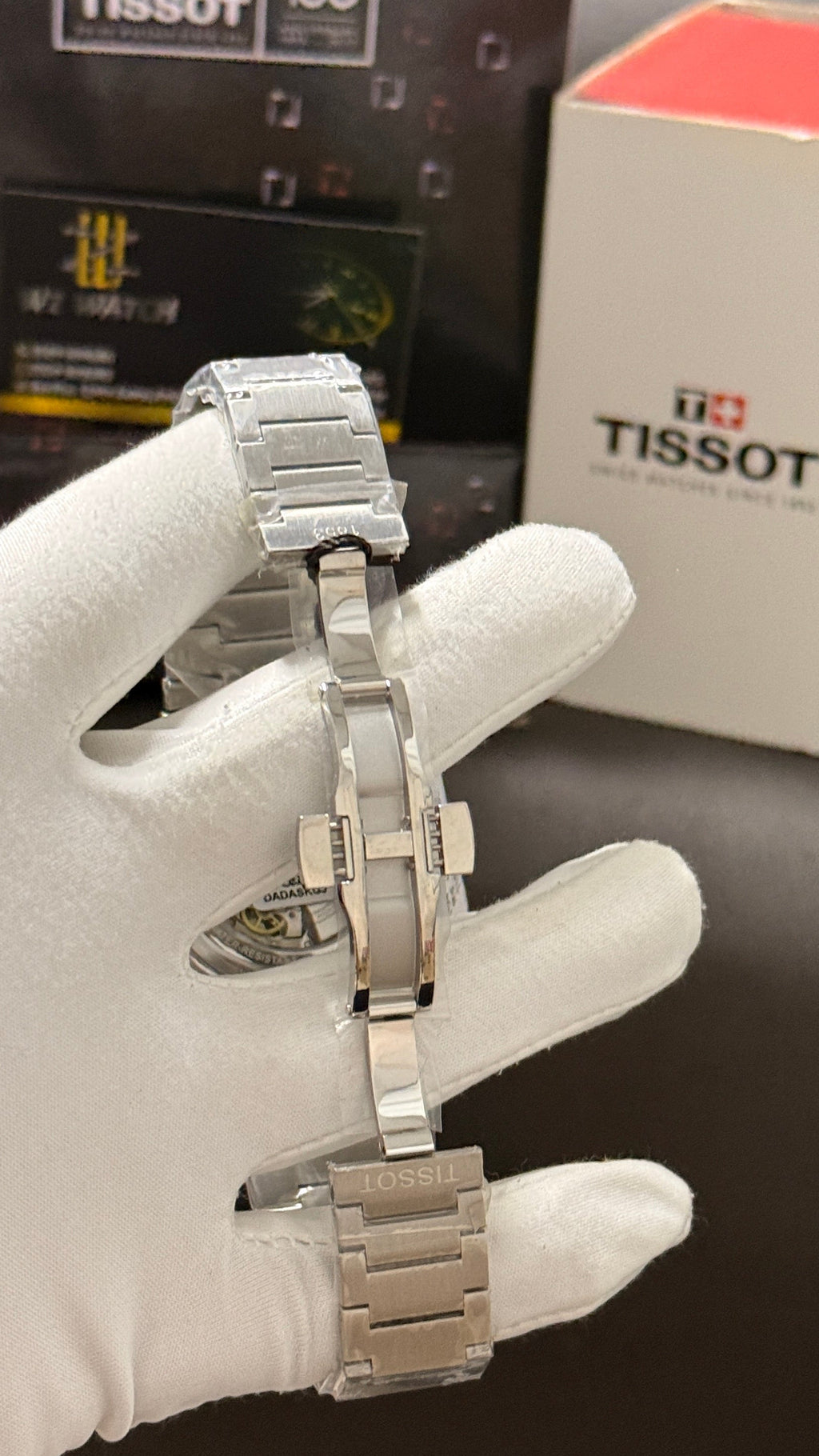 Silver with blue dial