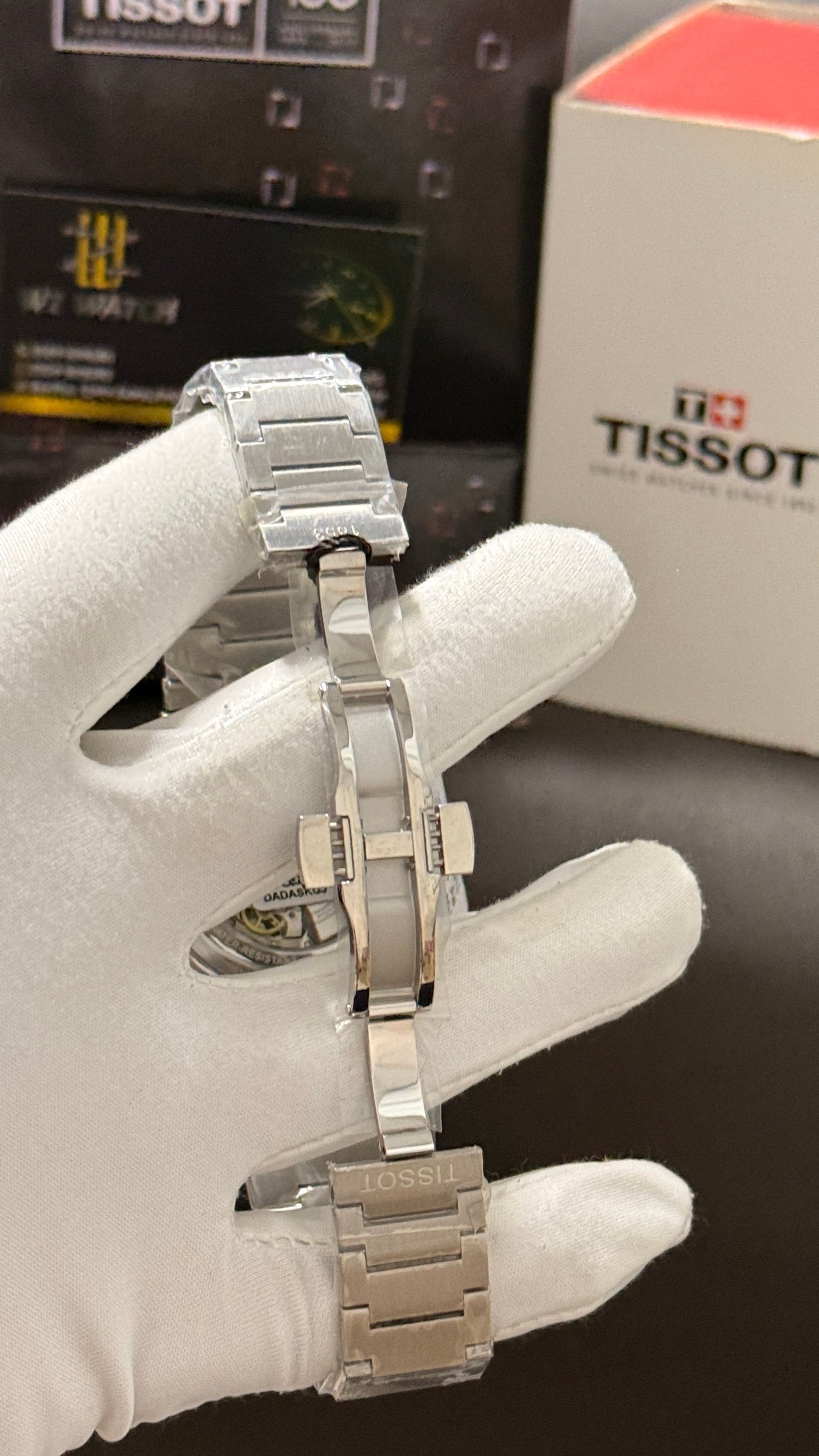 Silver with blue dial