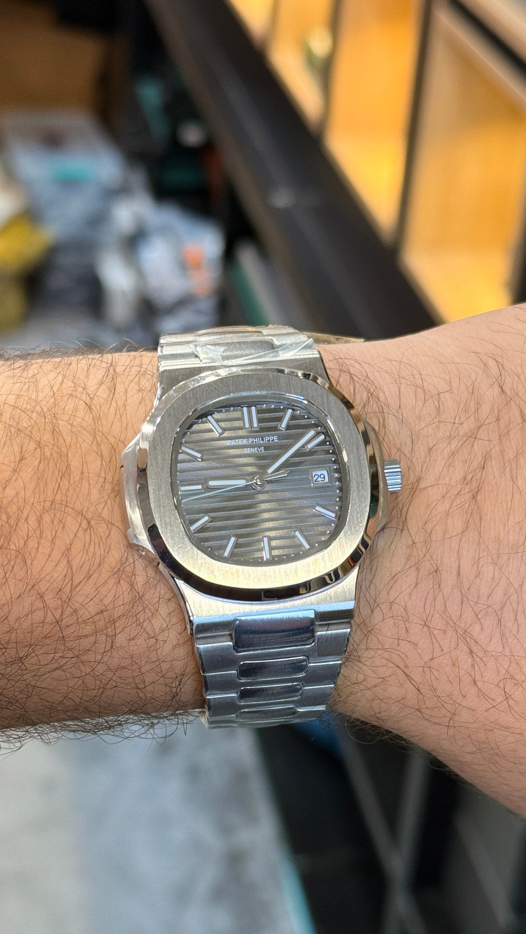 Silver with grey Dial.