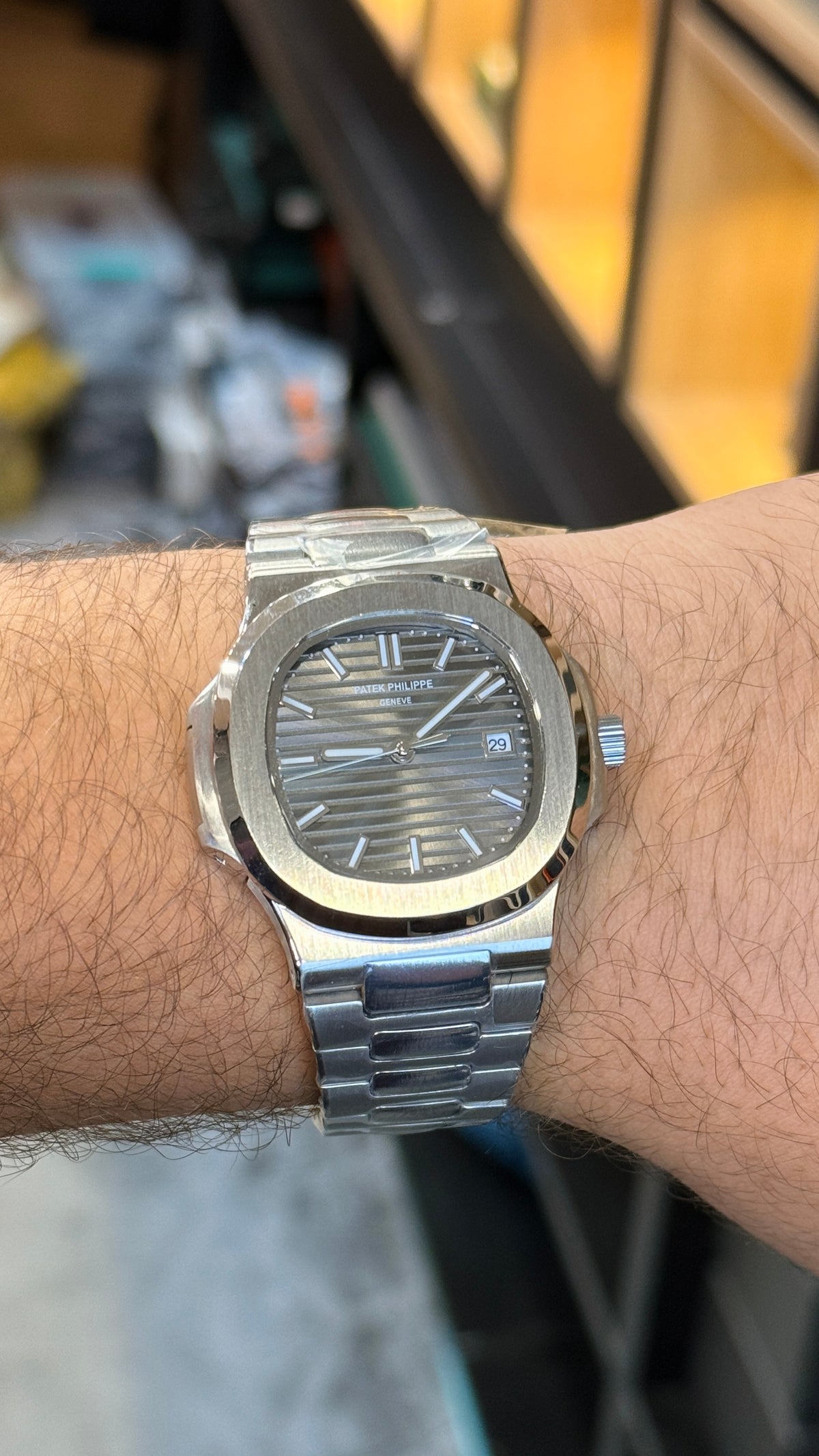 Silver with grey Dial.