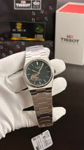Silver with green dial