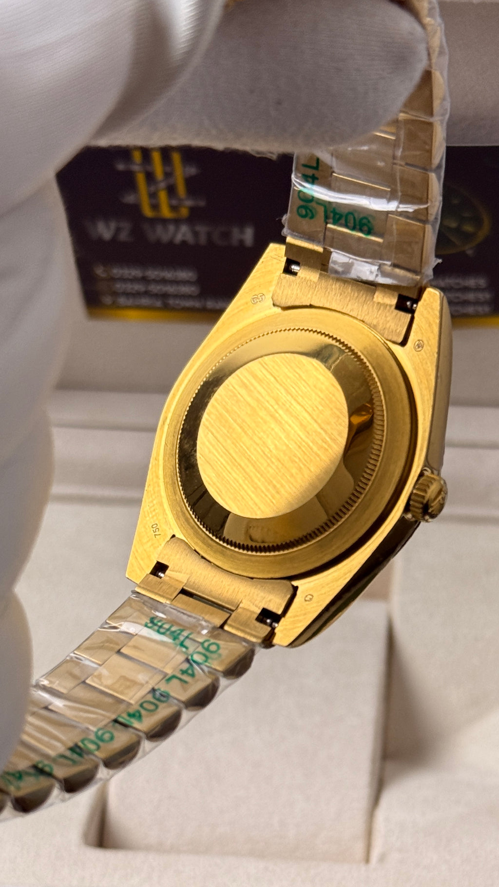 Yellow Gold with  Green Dial.
