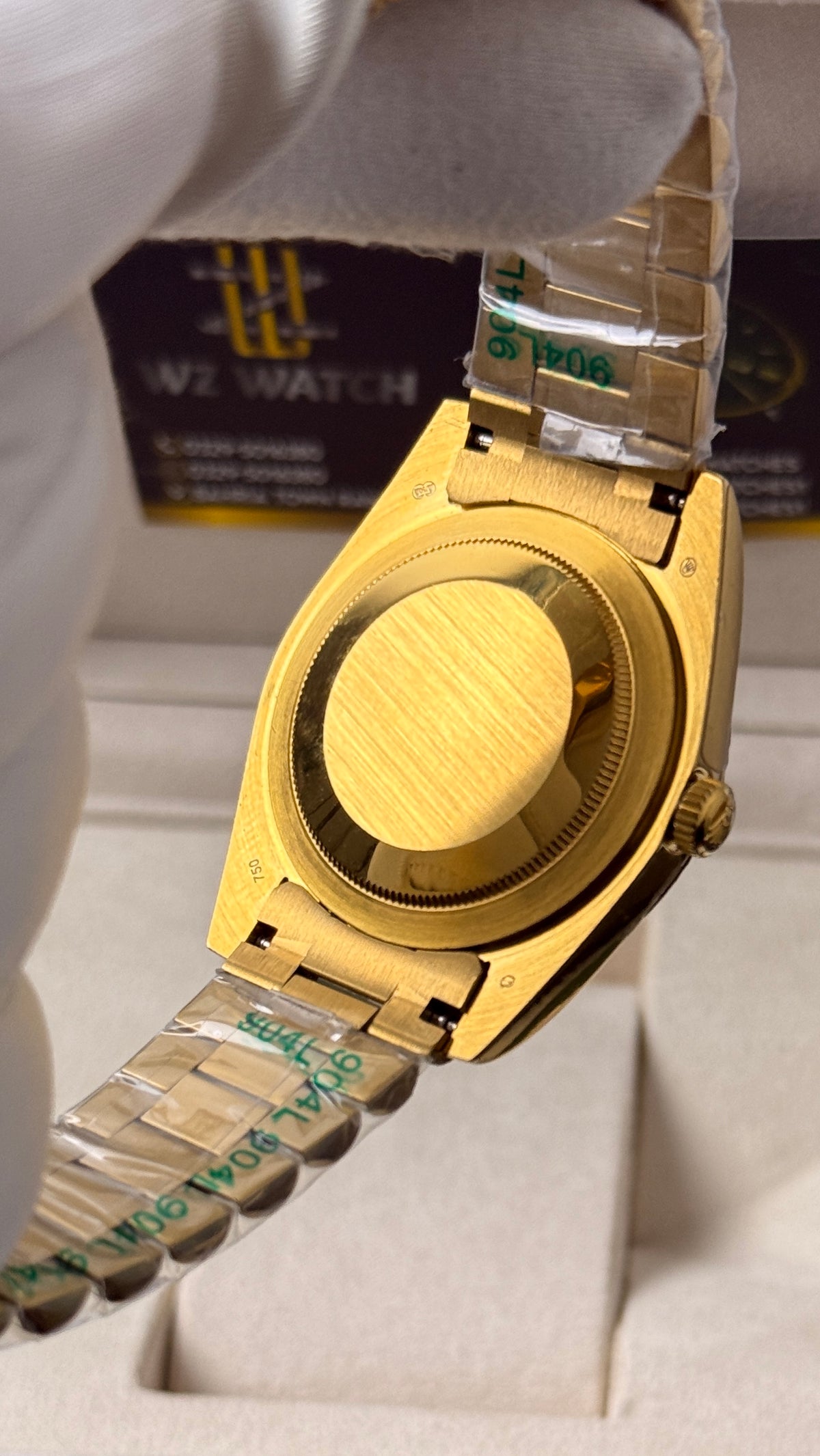 Yellow Gold with  Green Dial.