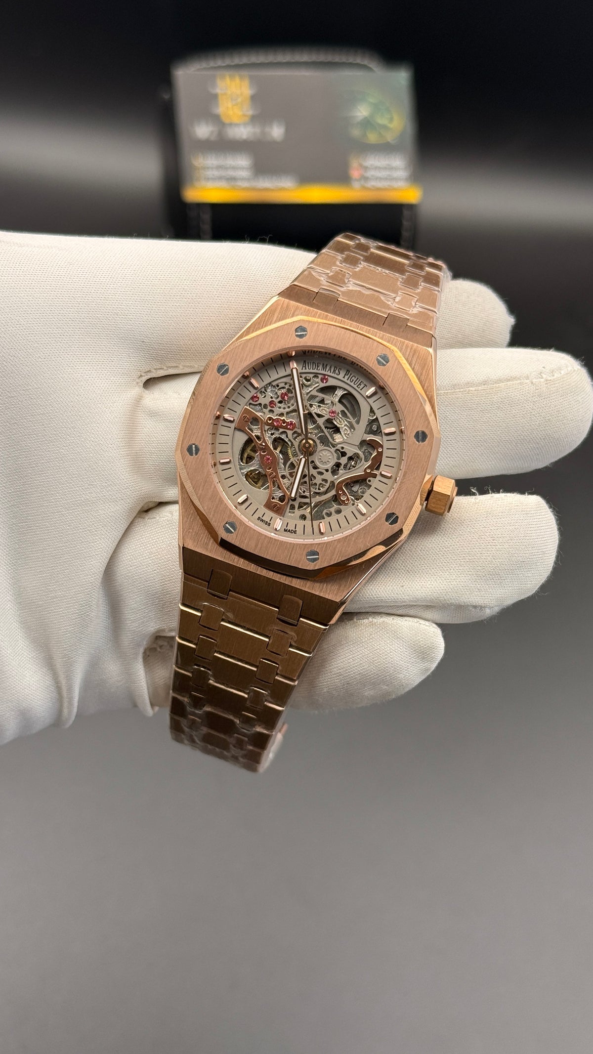 Rose gold with white  skeleton Dial.