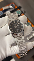 Silver with black Dial