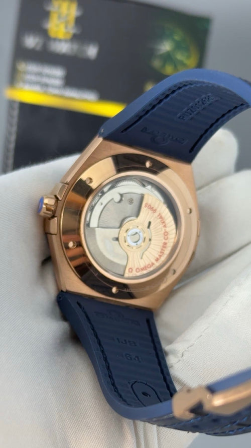 Rose Gold with Blue Dial.