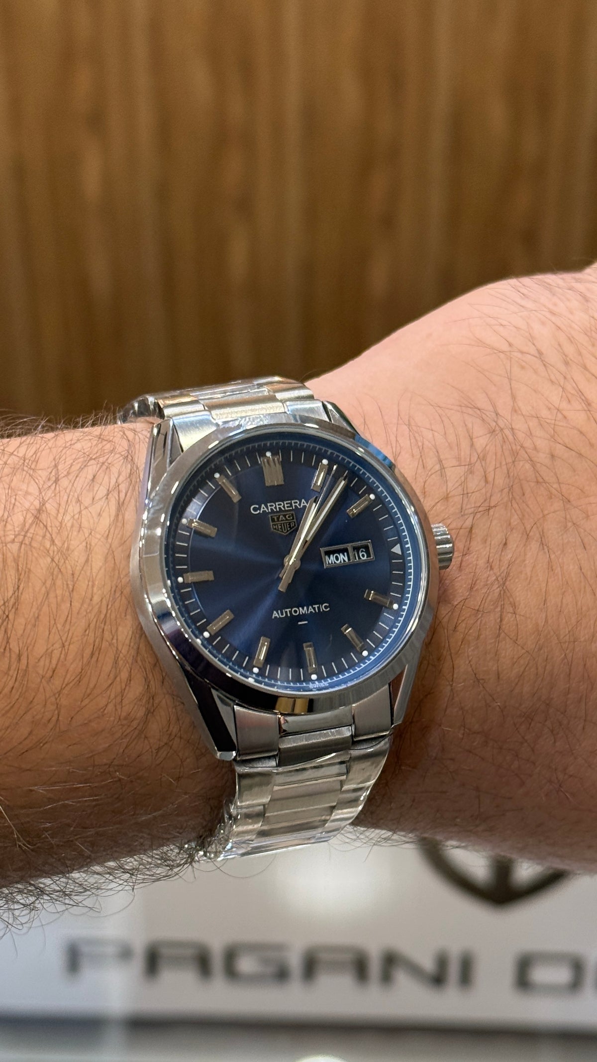 Silver with blue Dial.