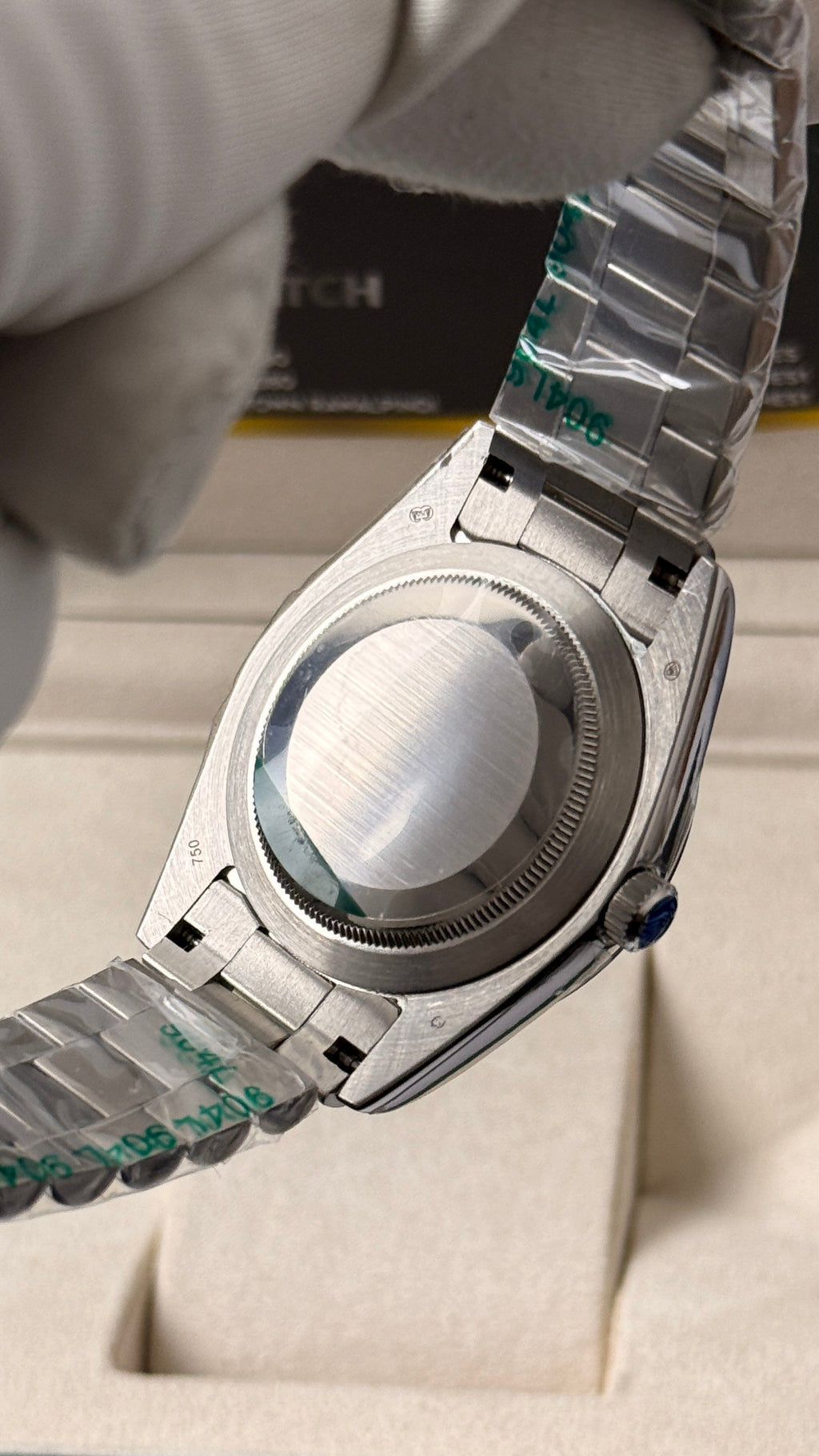 Silver with  green Dial.