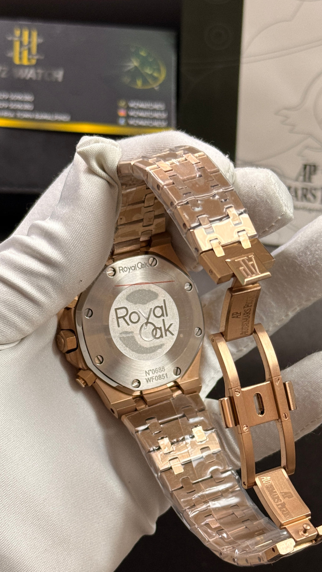 Rose gold with black dial