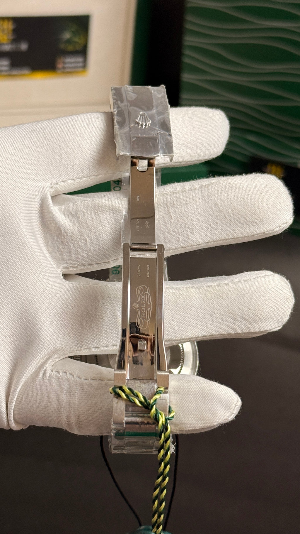Silver with green Dial.