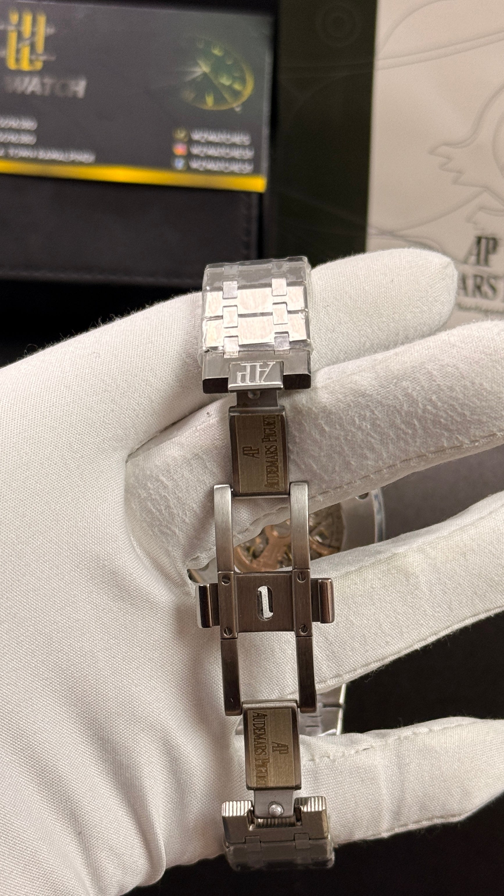 Silver with orange skeleton dial