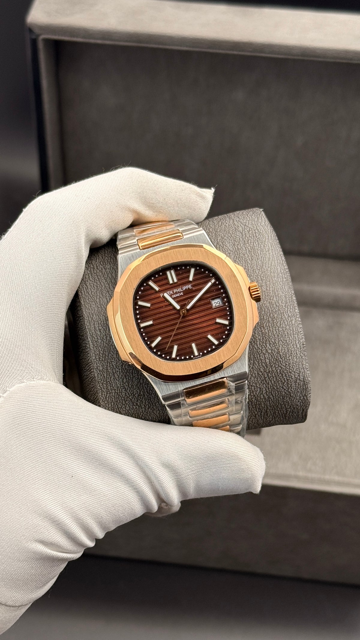 Rose gold two tone with chocolate Dial.