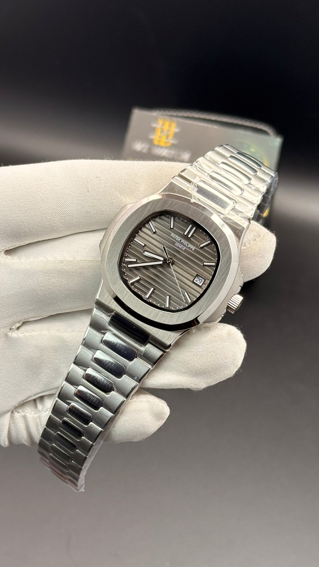 Silver with grey Dial.