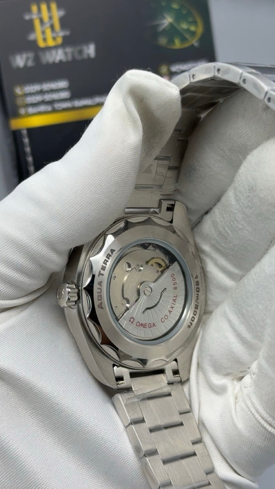 Silver with Green Dial.