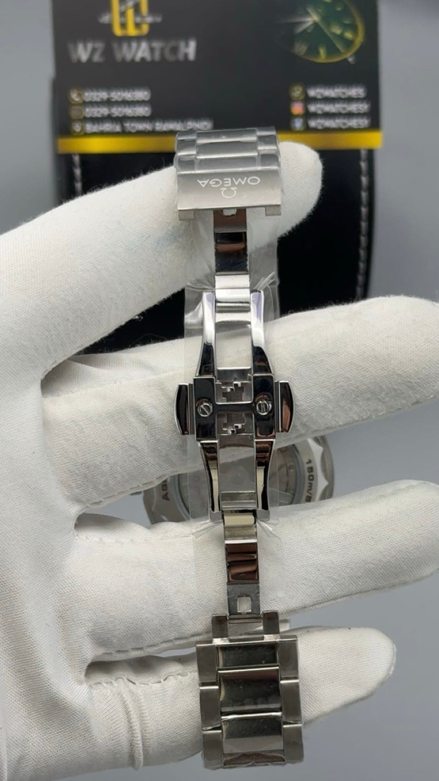 Silver with Green Dial.