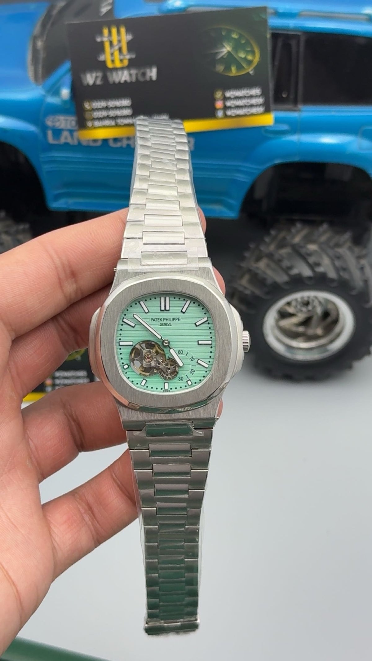 Silver with tiffany Dial.
