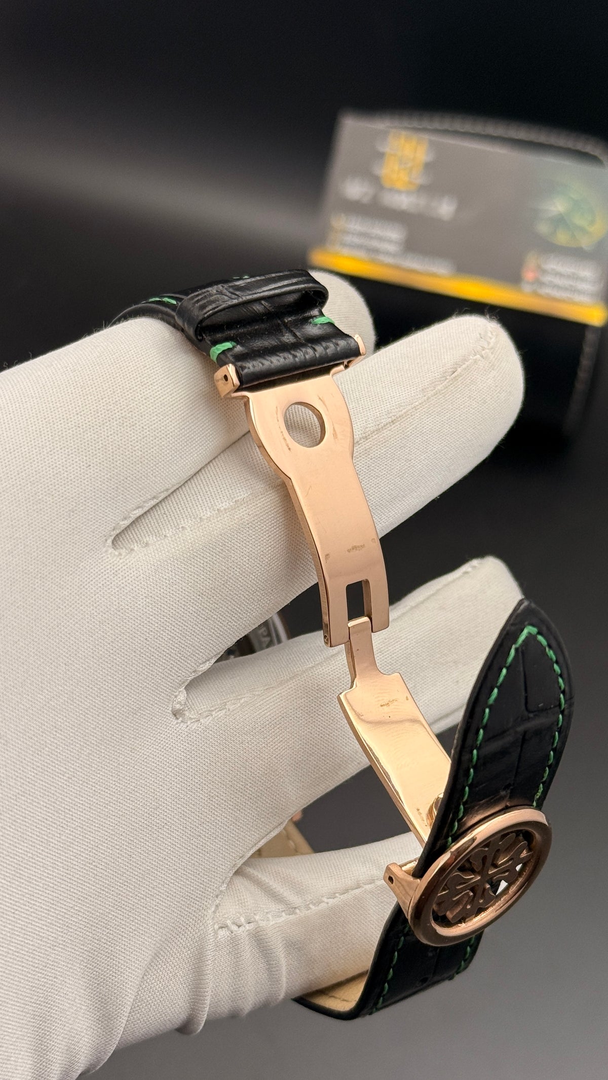 Rose gold with green Dial.