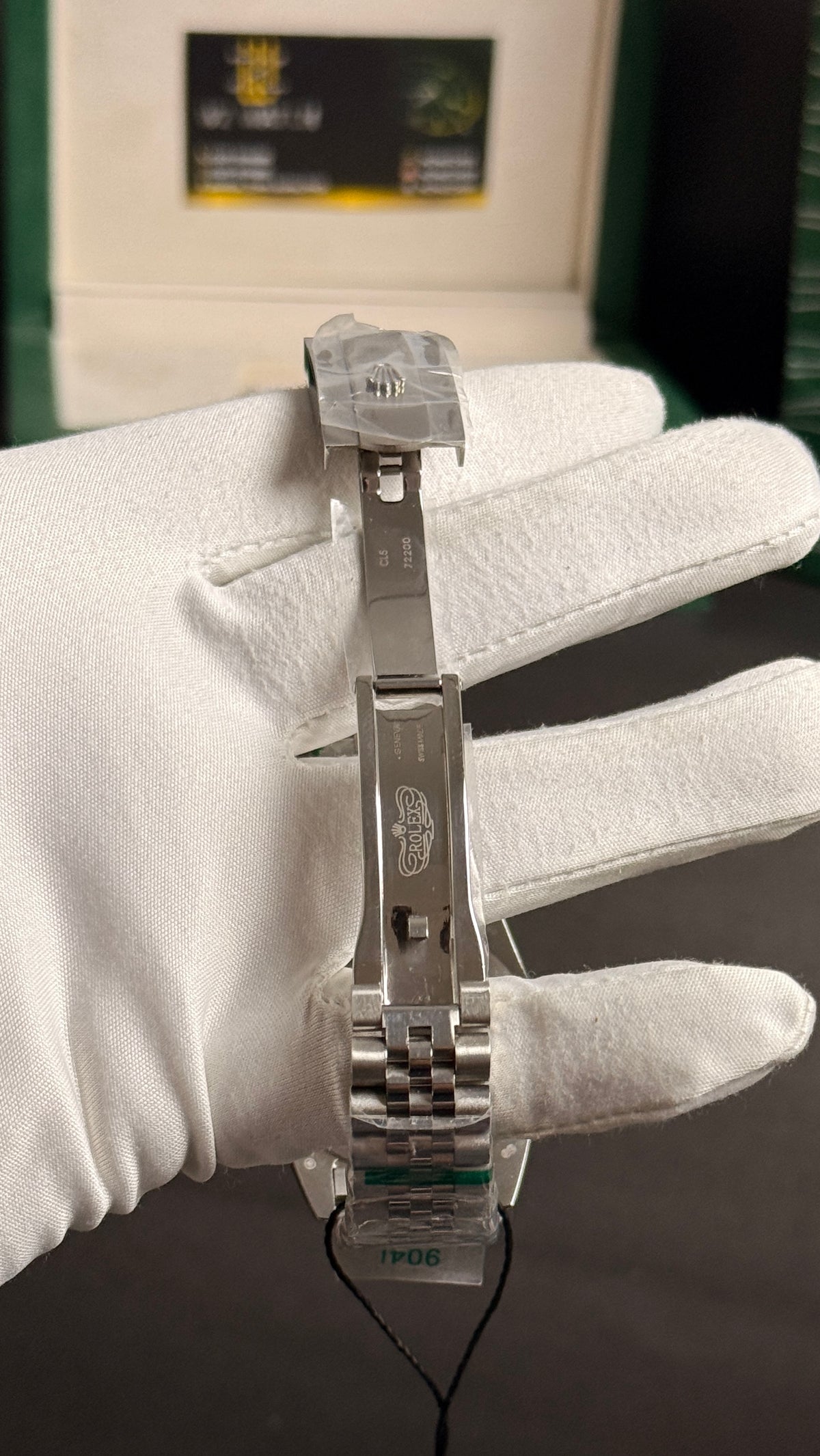 Silver with grey Dial.