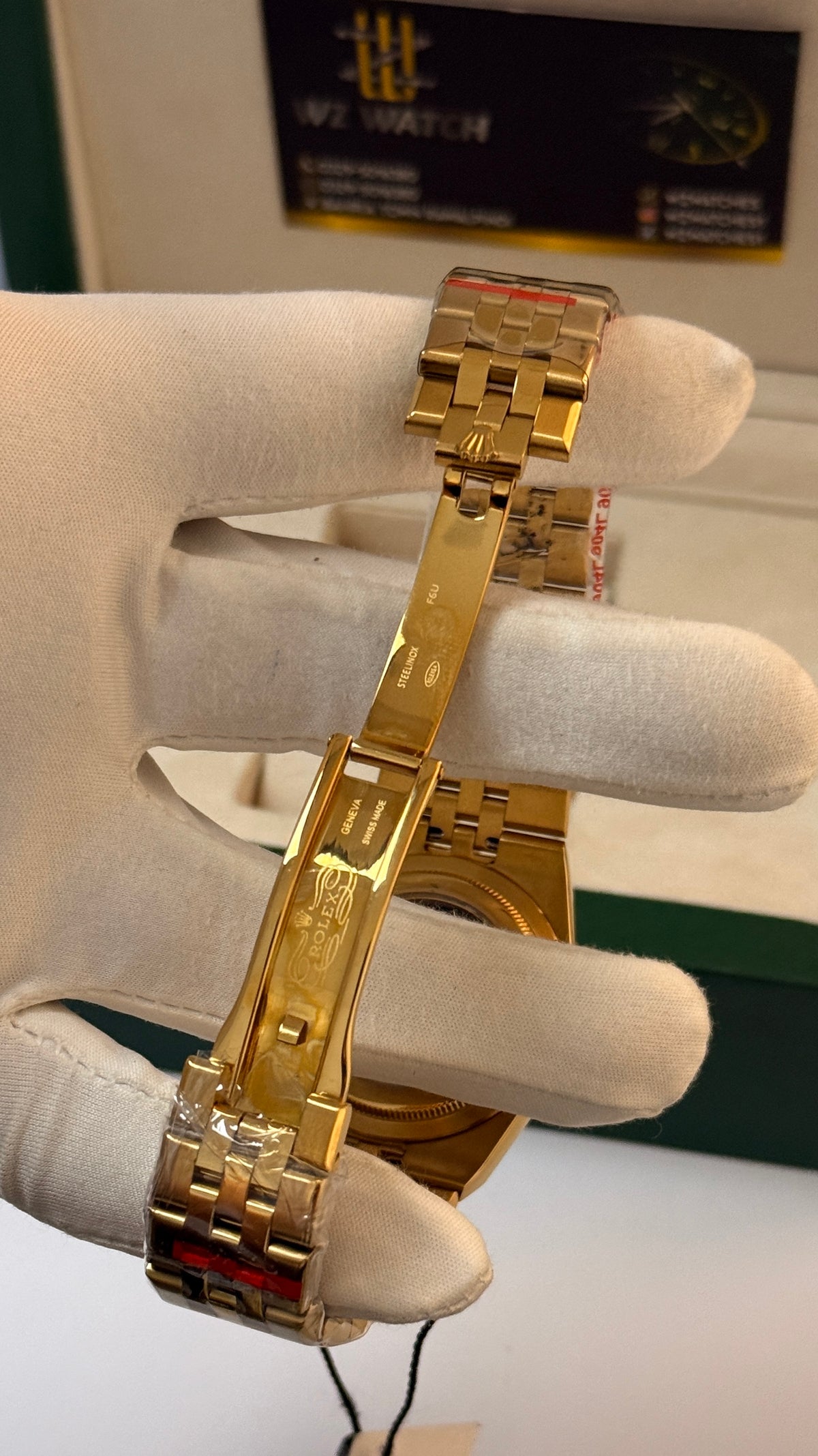 Yellow gold with sky blue Dial.