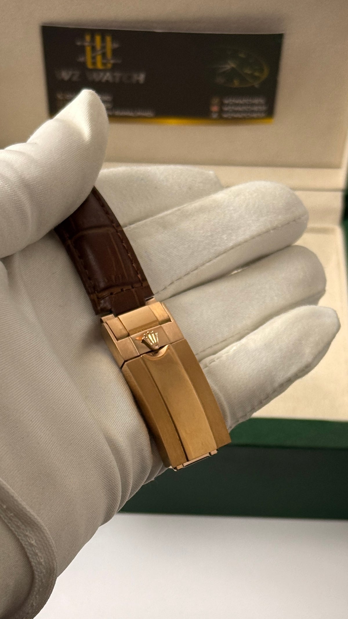 Rose gold with green Dial.