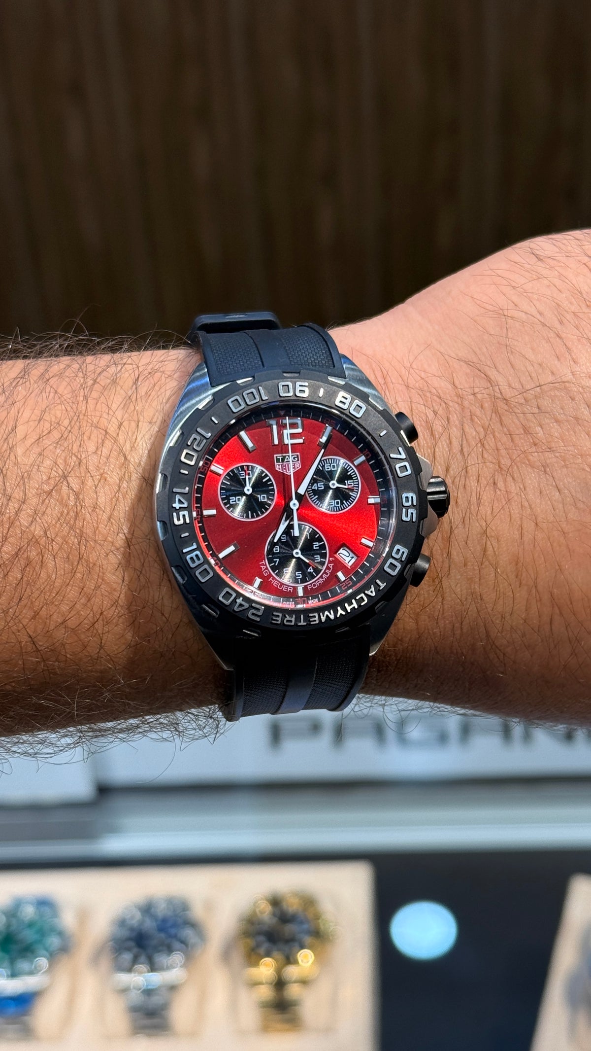 Silver with maroon Dial.