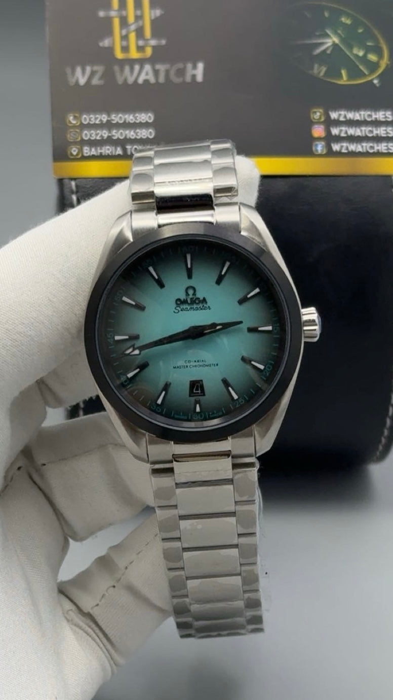 Silver with green Dial.