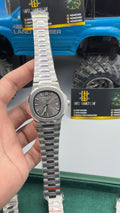 Silver with gray Dial.