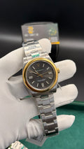 Silver with gray Dial.