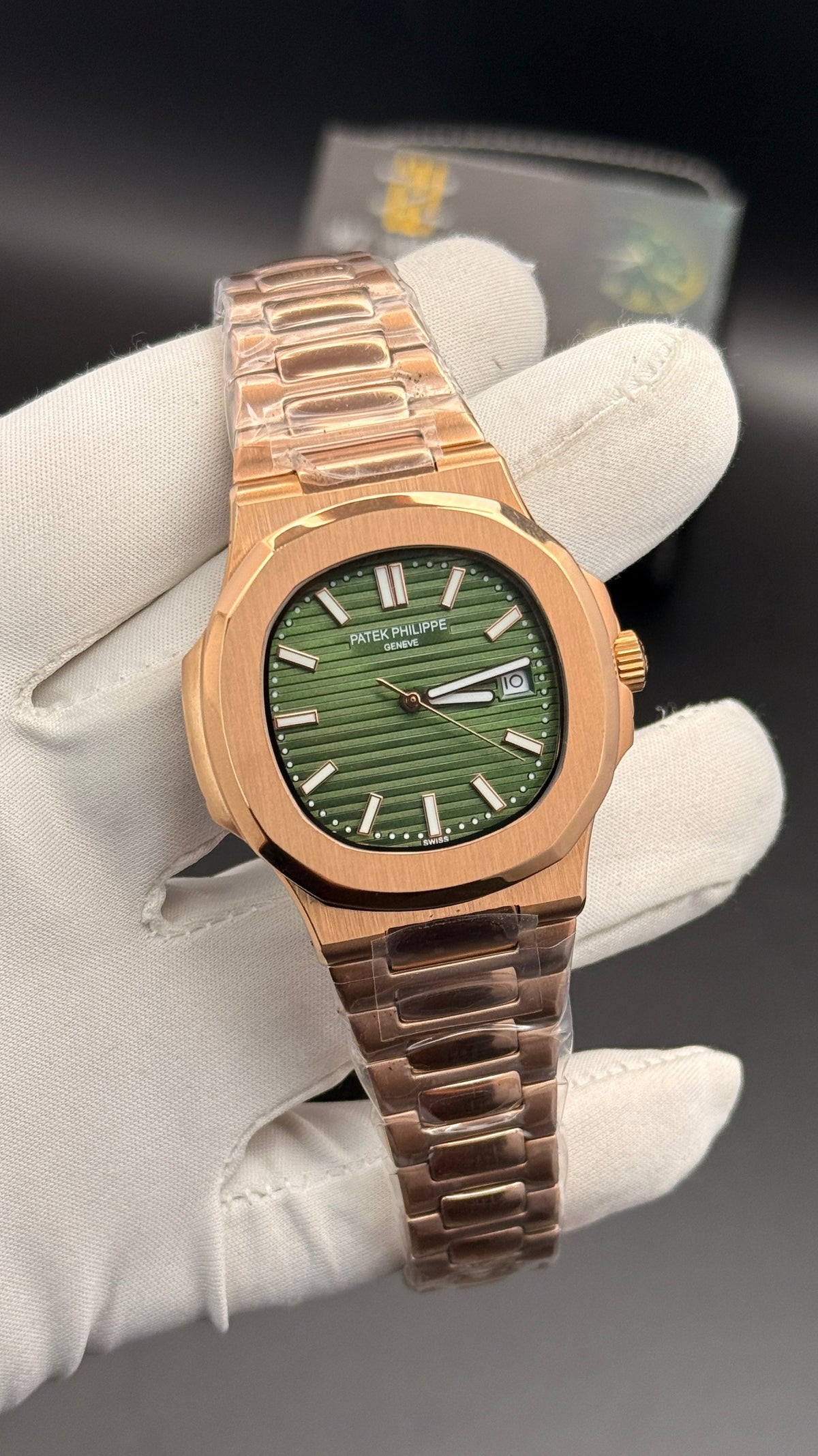 Rose gold with green Dial.