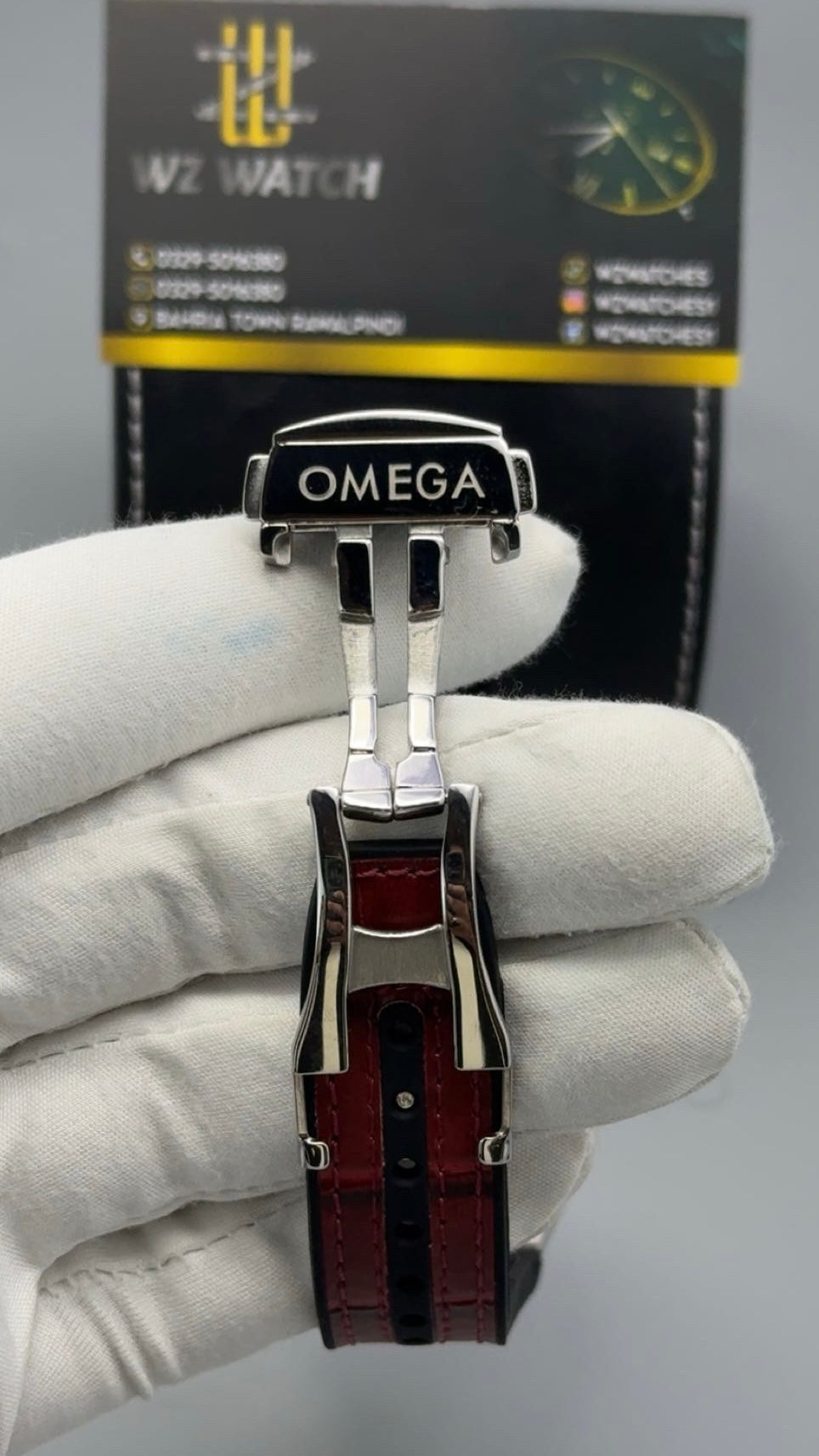 Silver with Maroon Dial.