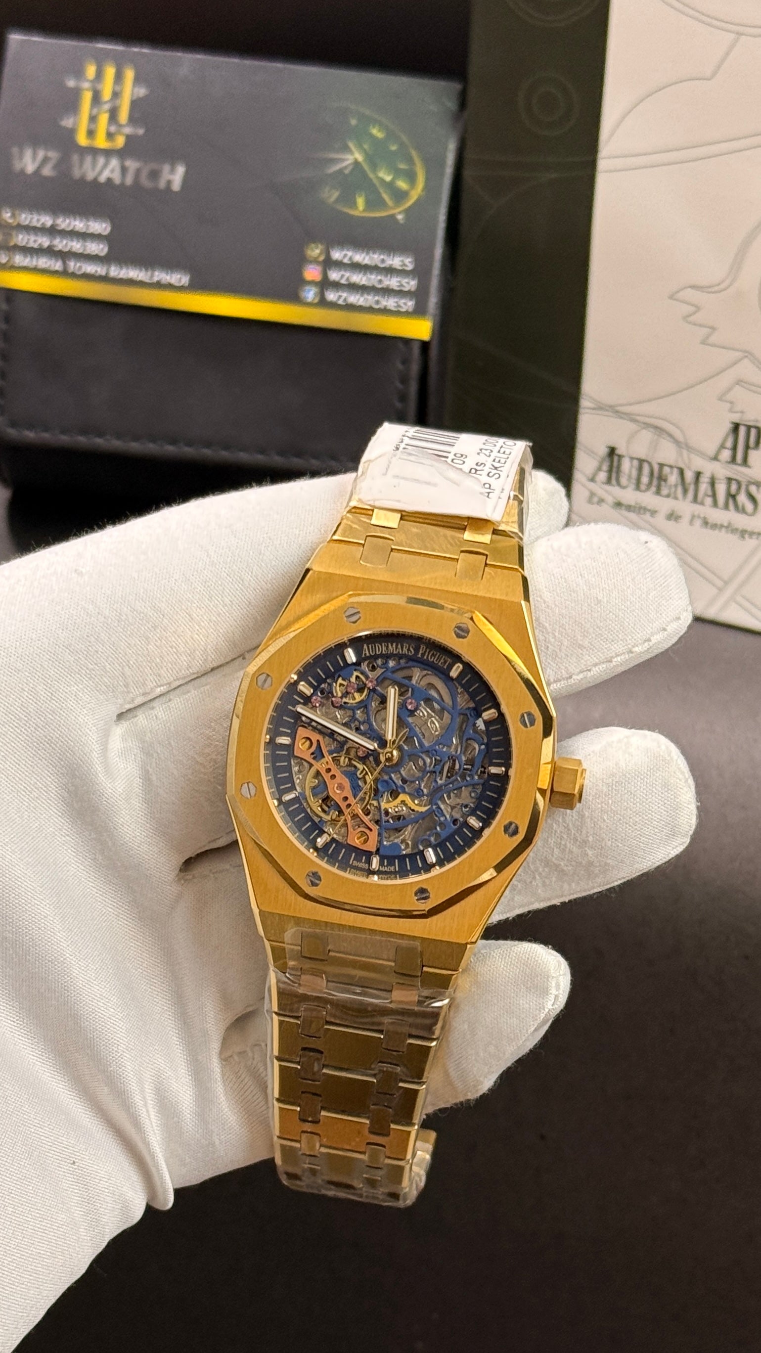 Yellow gold with blue skeleton dial