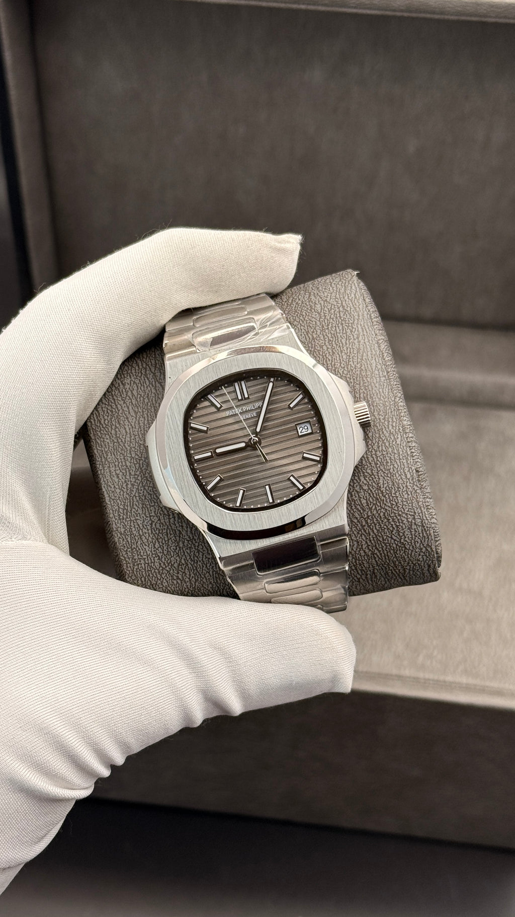 Silver with grey Dial.