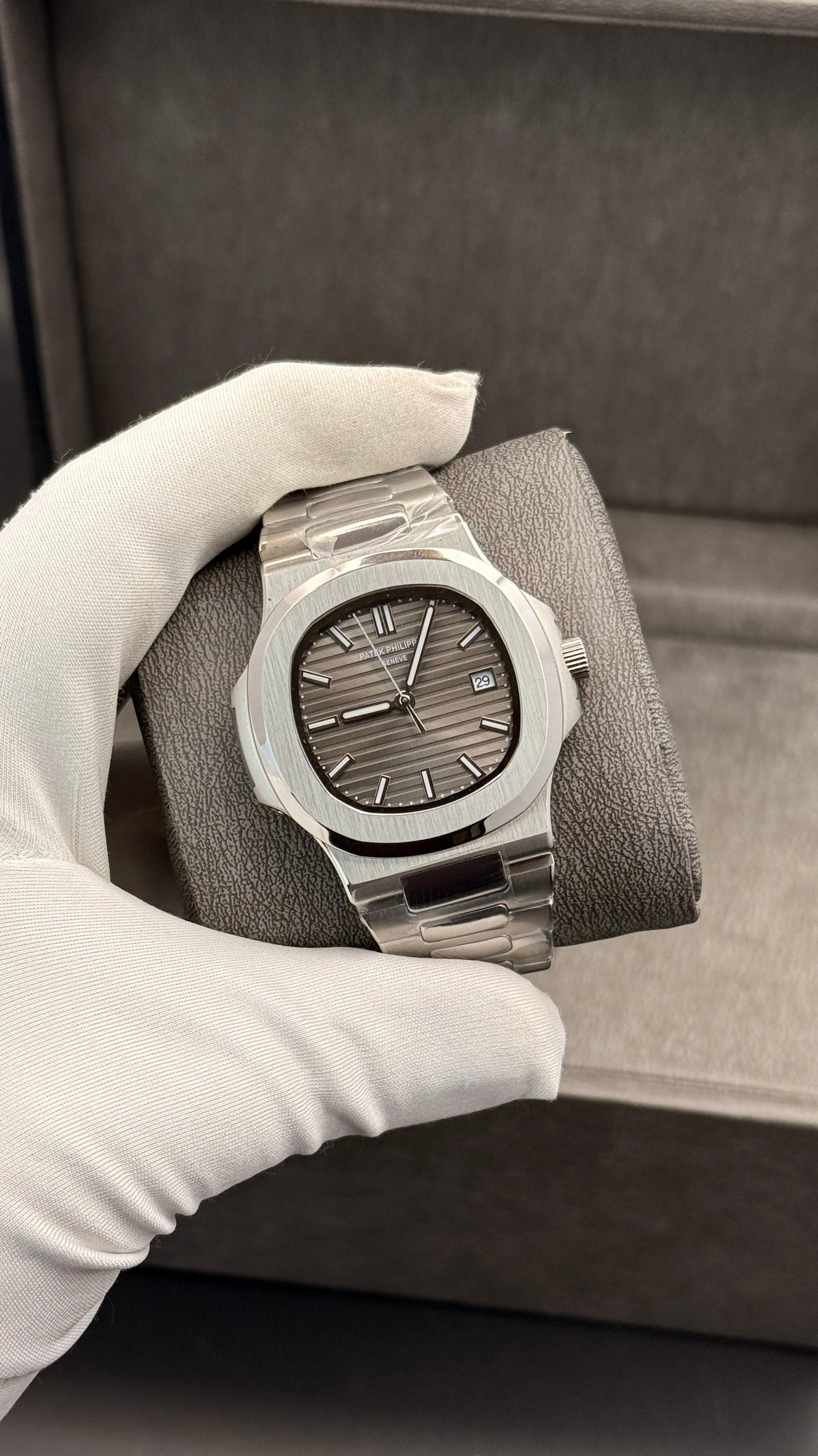 Silver with grey Dial.