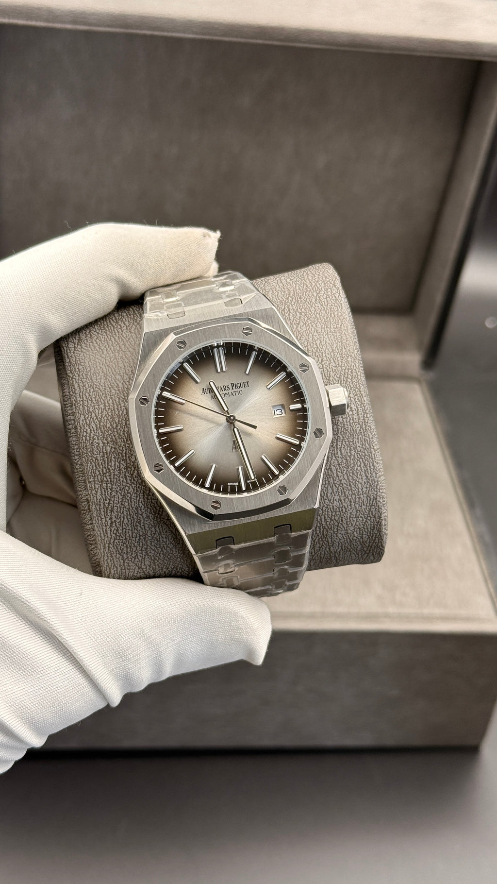 Silver with grey Dial.