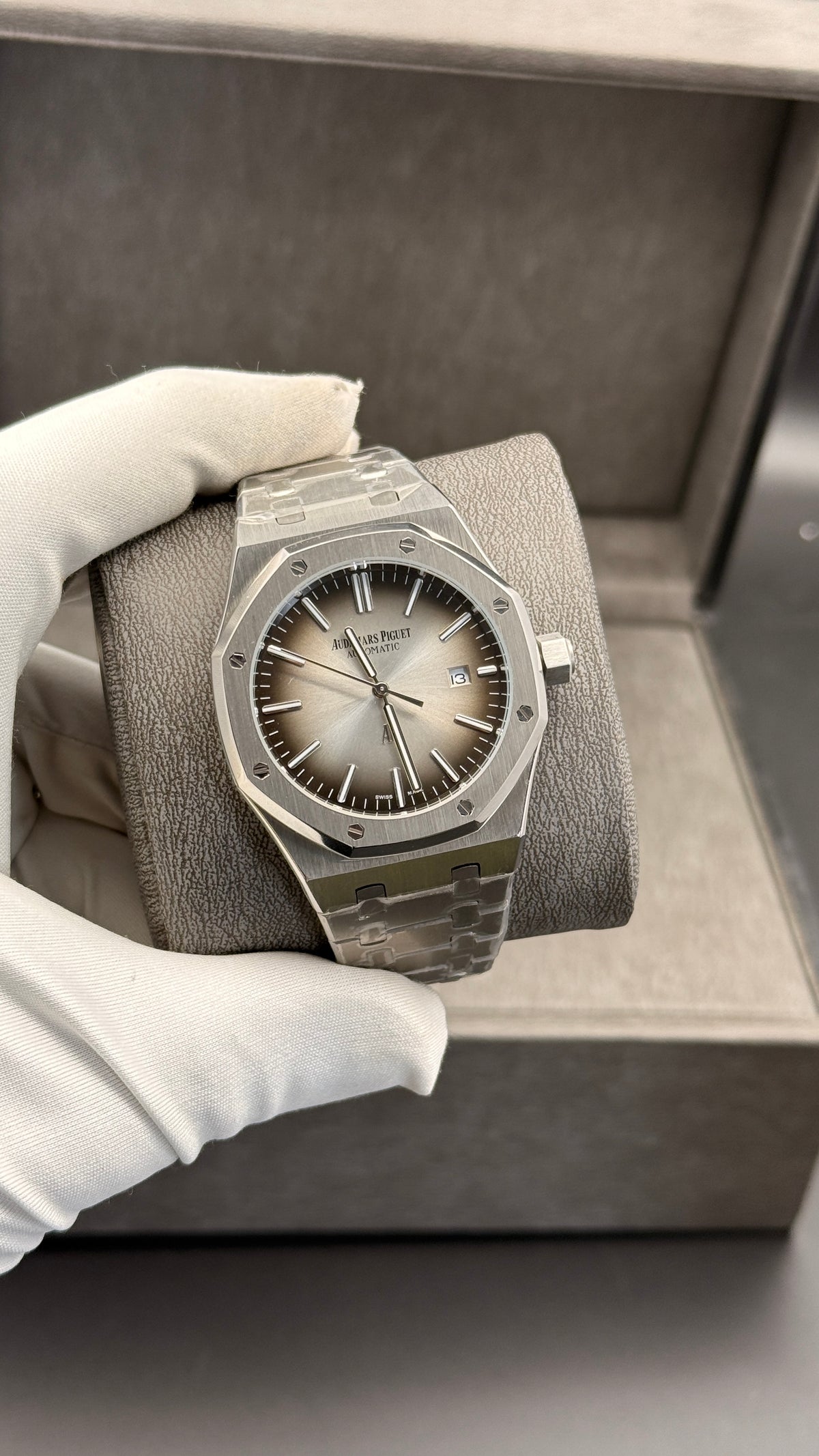 Silver with grey Dial.