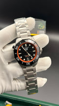 Silver with black Dial.