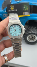 Silver with tiffany Dial.