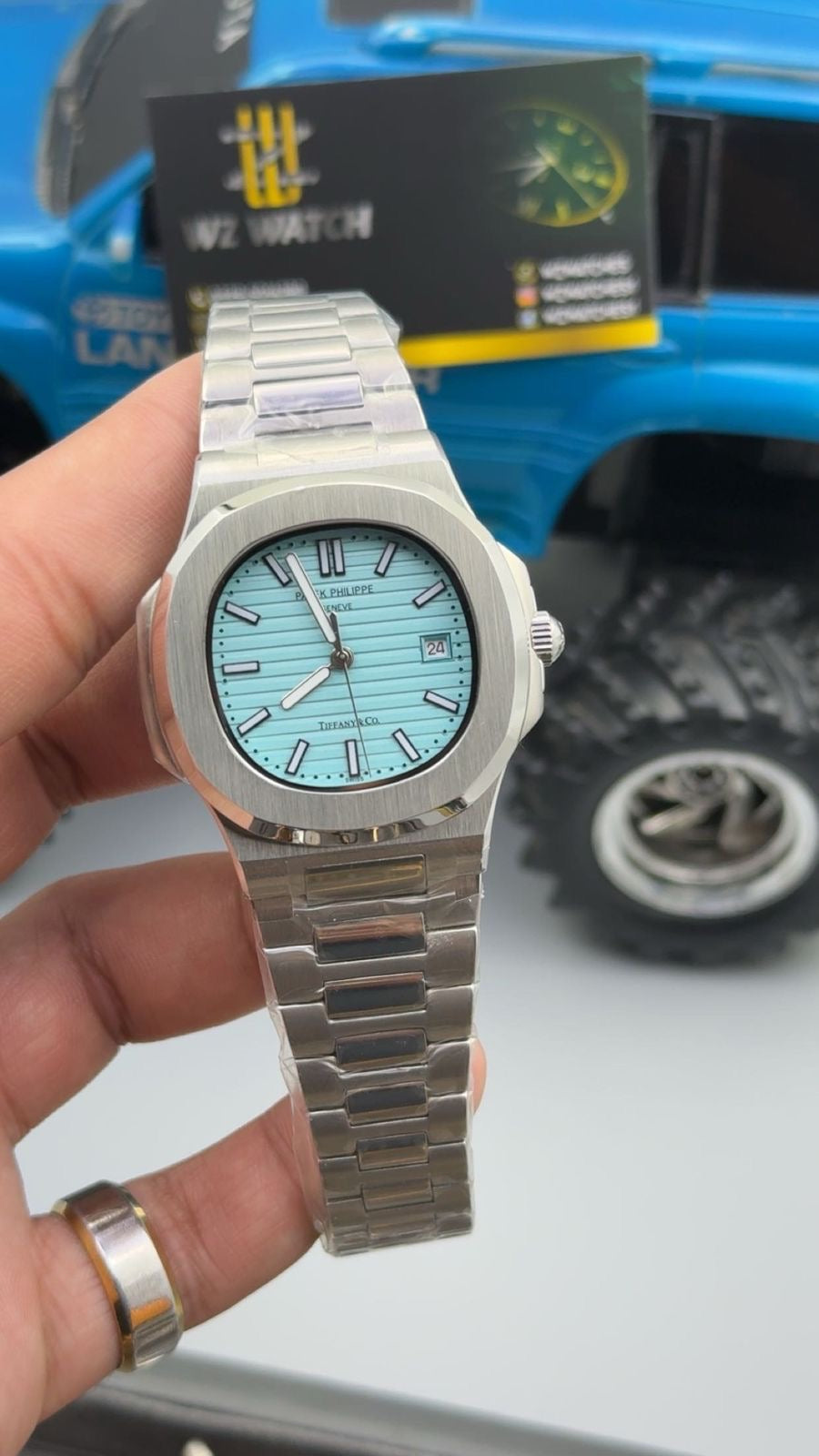 Silver with tiffany Dial.
