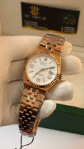 (36mm)Rose gold with white Dial.