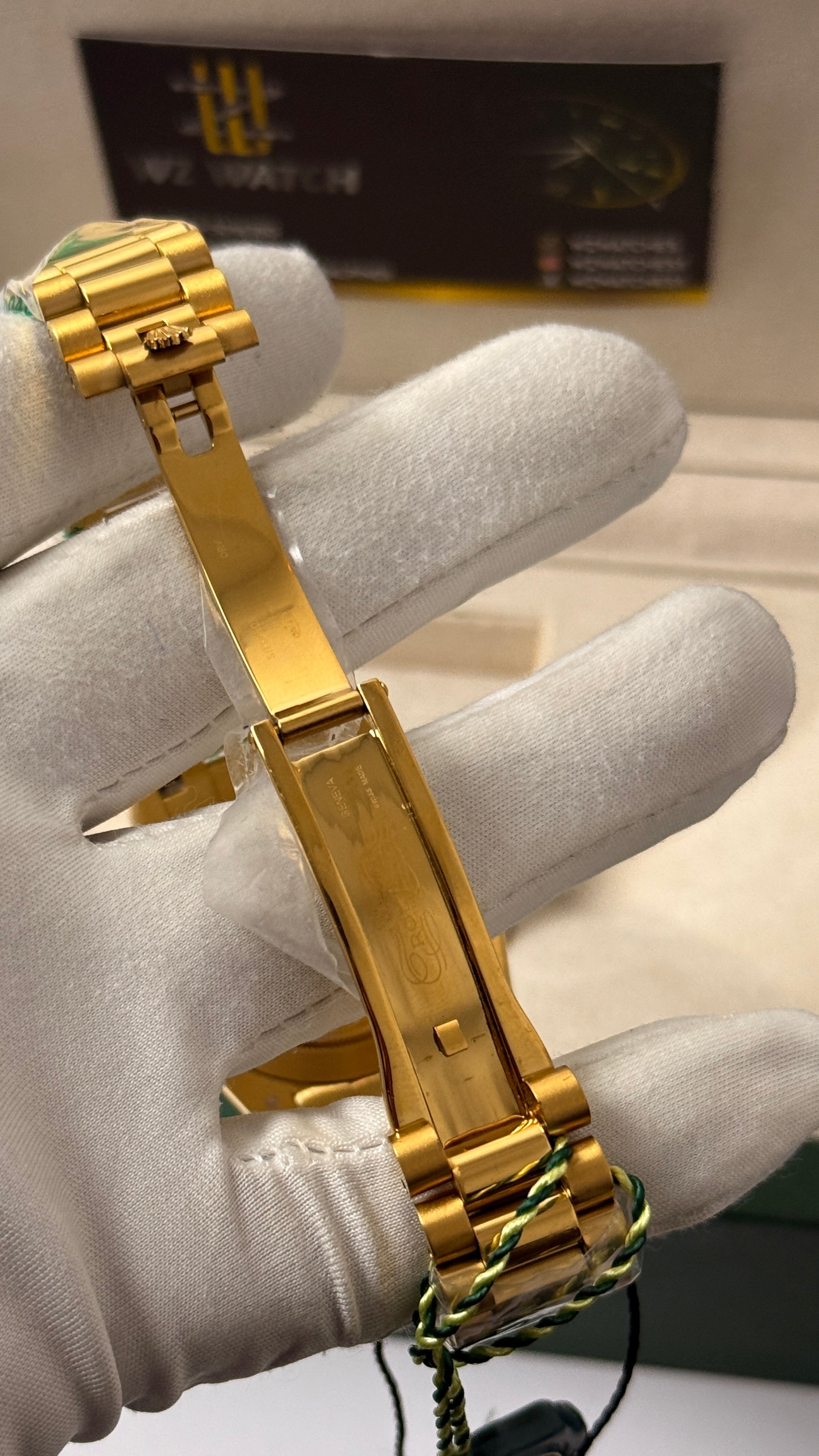 Yellow Gold with Olive Green Dial.