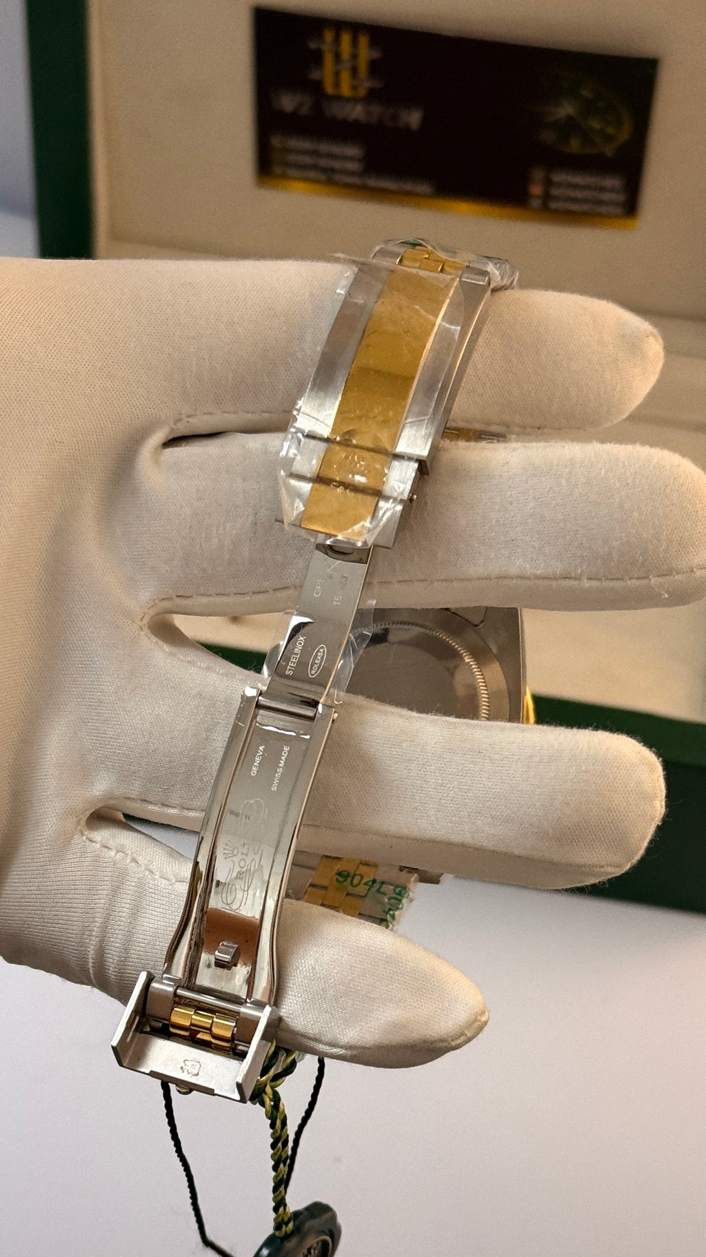 Yellow gold with two tone with black Dial.