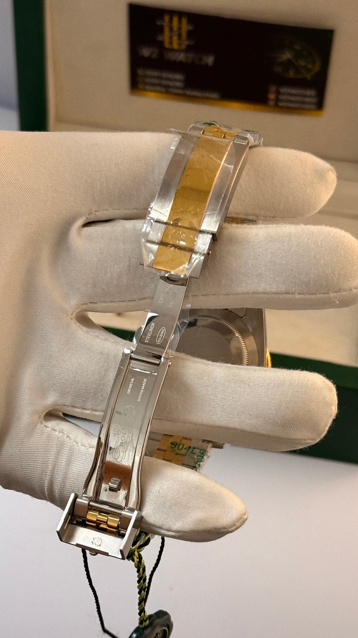 Yellow gold with two tone with black Dial.