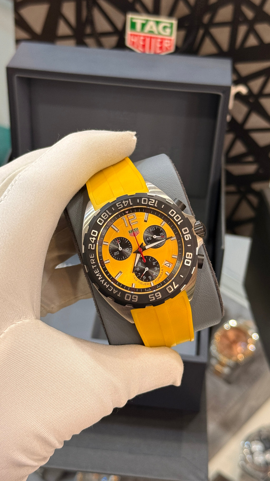 Silver with yellow Dial.