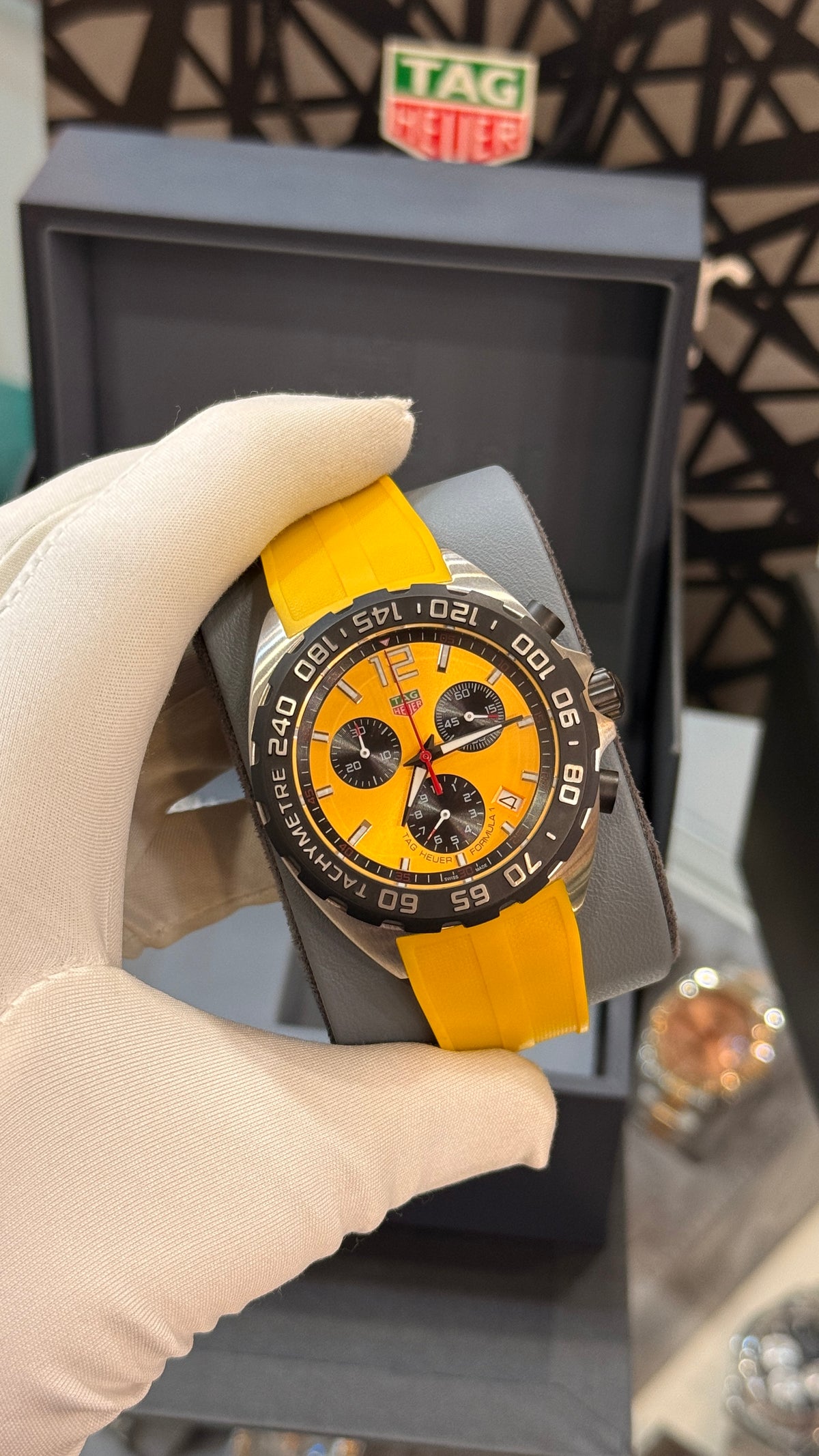 Silver with yellow Dial.