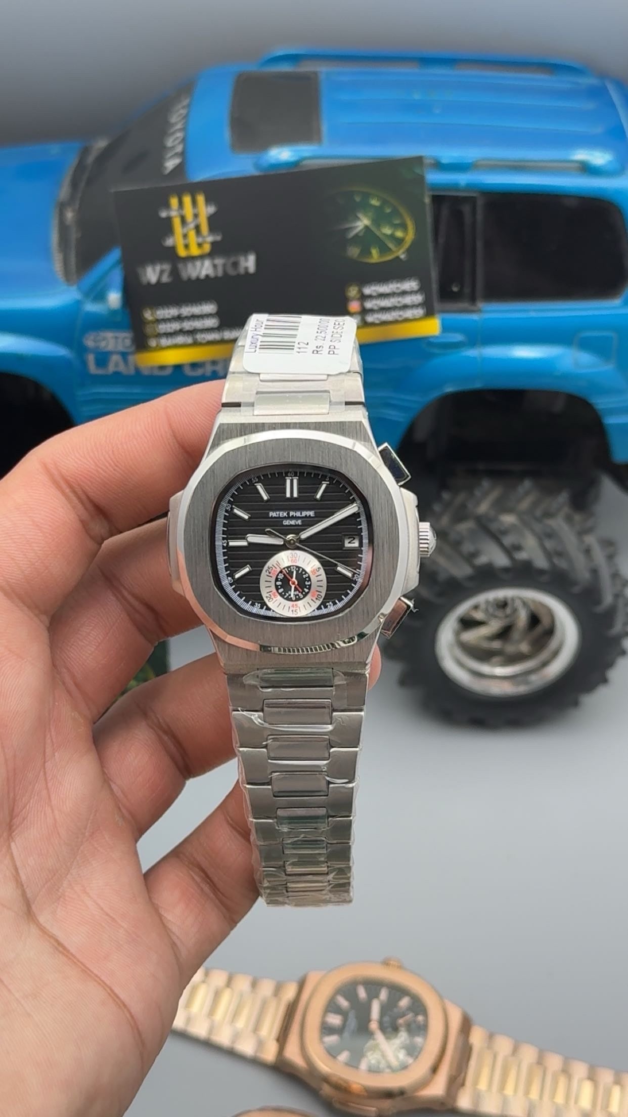 Silver with black Dial.